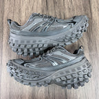 Pair of gray Balenciaga lace-up sneakers with sculpted lug tread soles