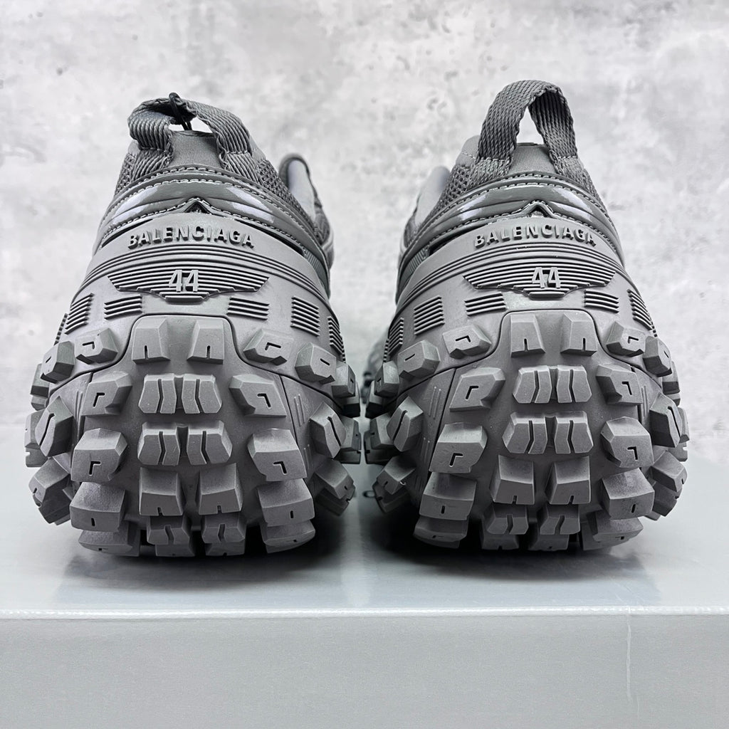 Balenciaga sneakers heel view with 'Balenciaga' branding and rugged lug soles