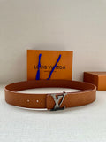 Tan monogram leather belt with silver buckle and central LV logo