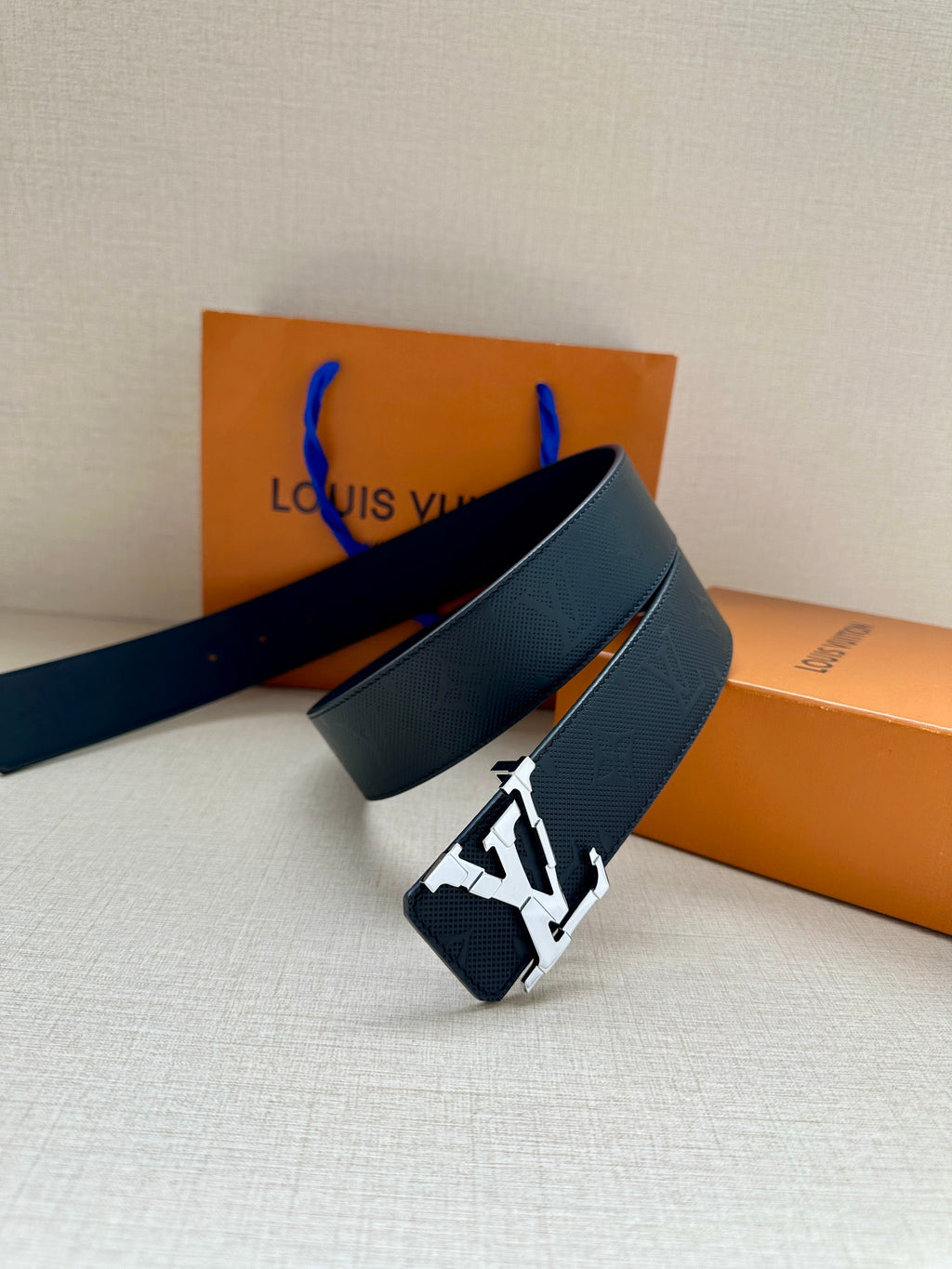 Dark blue leather belt with LV buckle and long strap