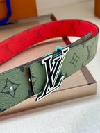 Louis Vuitton belt buckle close-up on green monogram strap with red lining