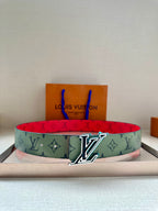 Louis Vuitton belt, green monogram strap with silver LV buckle and red reverse