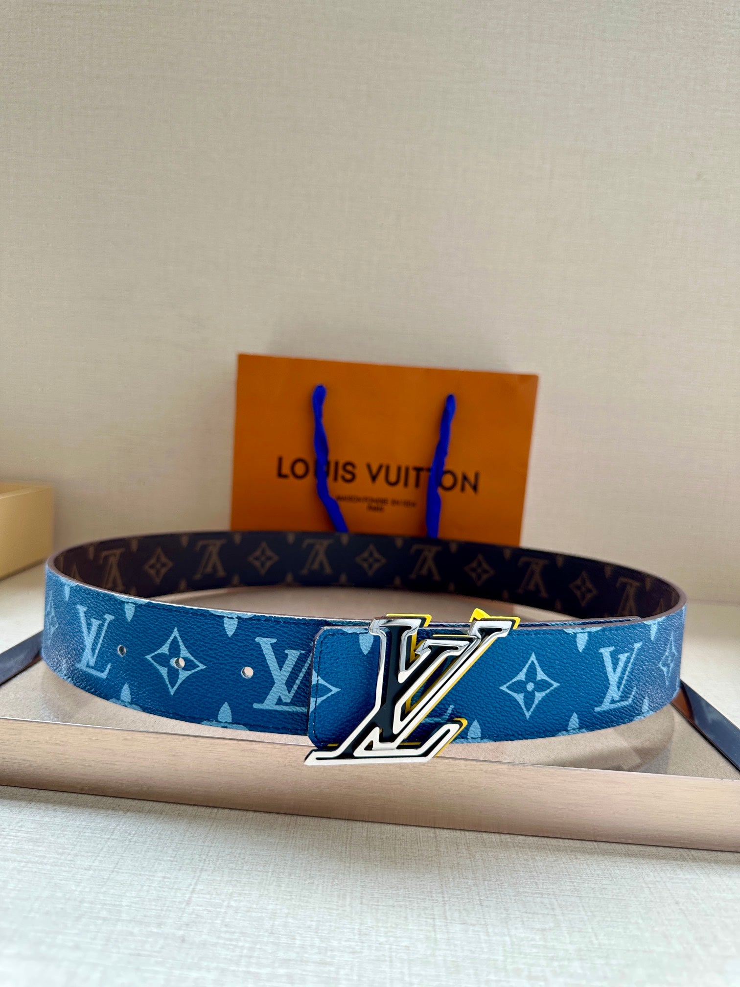 Louis Vuitton belt in blue monogram canvas with large silver LV buckle