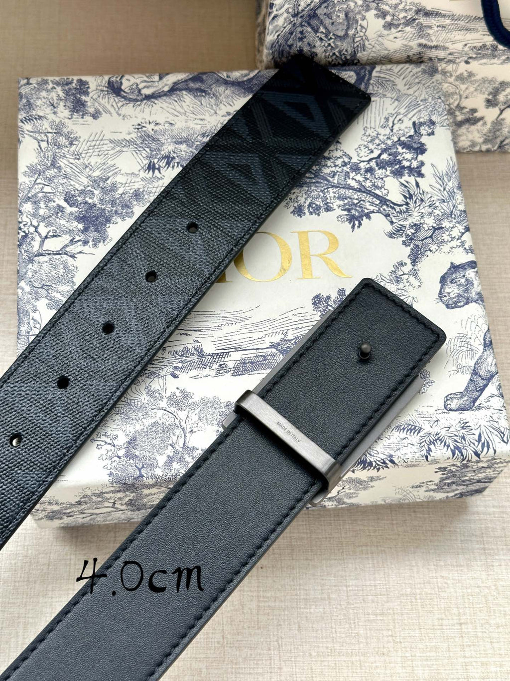 Dior belt with dark blue leather strap and rectangular silver-tone buckle