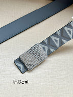 Dior belt clasp end with blue leather tab and gray jacquard logo panel