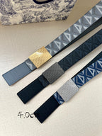 Dior belts shown side by side, blue and dark straps with gold-tone buckle