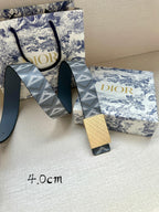 Dior belt patterned strap with gold-tone buckle and hanging tag