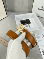 Tan leather belt in gift box with gold-tone CC buckle and hanging strap