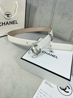 White leather belt with silver-tone CC buckle and adjustable strap holes