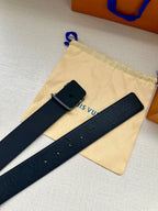 Louis Vuitton belt on dust bag: dark navy embossed strap with square dark buckle tab