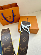 Louis Vuitton monogram belt with gold buckle and blue edge trim, side view