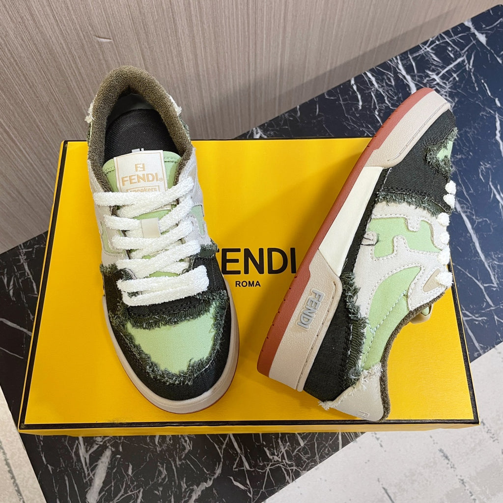 Fendi low-top sneakers, pair on yellow box, white laces, lime green/black, cream sole.