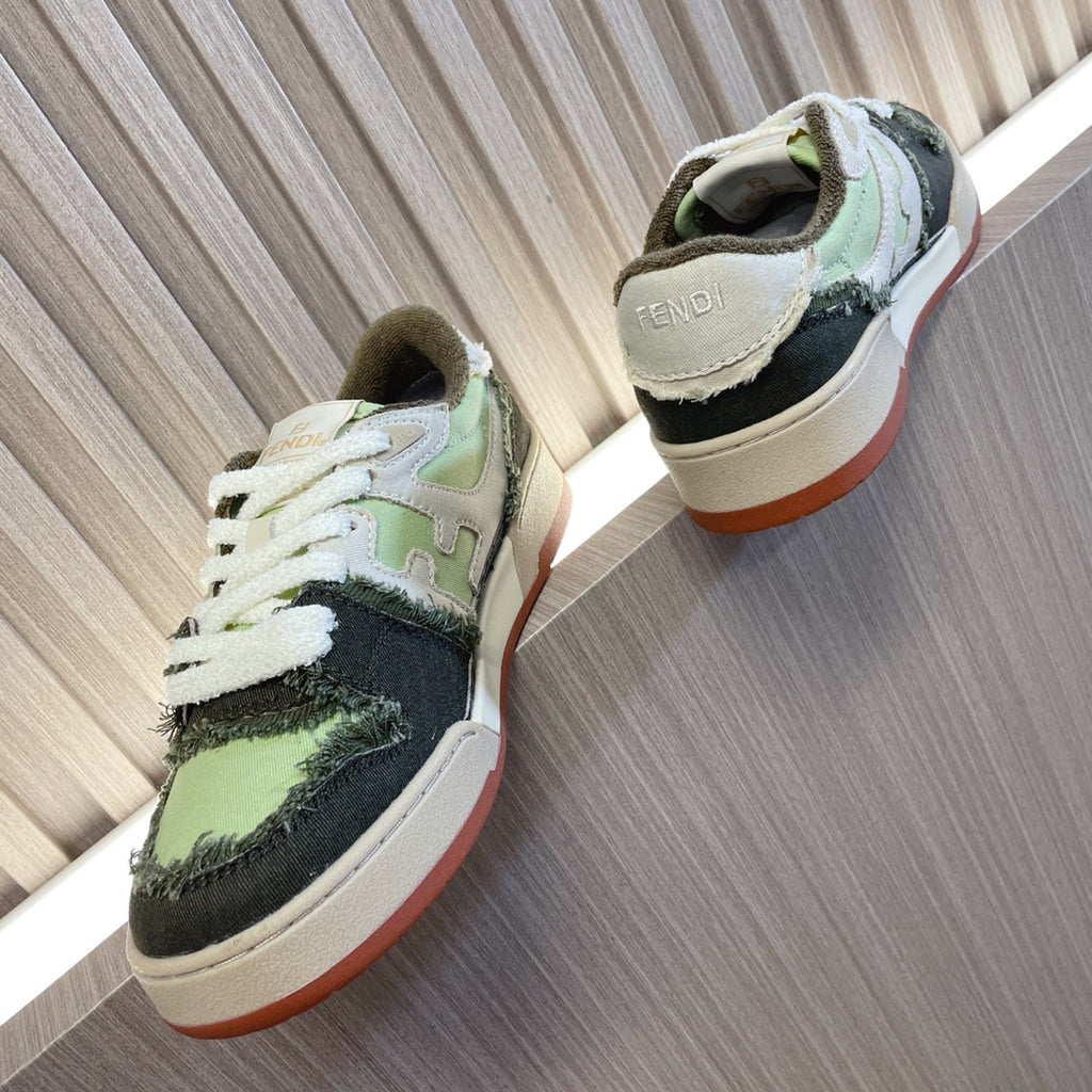 Fendi low-top sneakers, rear view, white laces and lime green/black upper, cream sole.