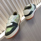 Fendi low-top sneakers, rear view, white laces and lime green/black upper, cream sole.