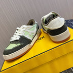 Fendi low-top sneakers, heel and side view, lime green/black upper, cream sole.