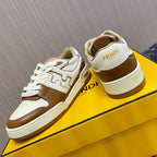 Unisex Fendi leather sneakers on box, front and heel views with brown trim