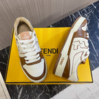 Unisex Fendi leather sneakers on box, white uppers with brown side panels