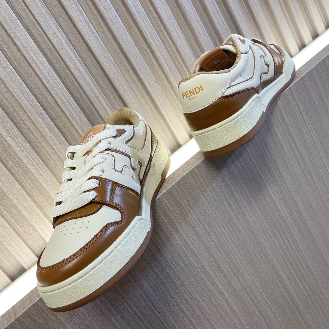 Unisex Fendi leather sneakers, side view with white uppers and brown overlays