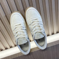 White leather lace-up sneakers with perforated toe and beige rubber sole, Fendi logo