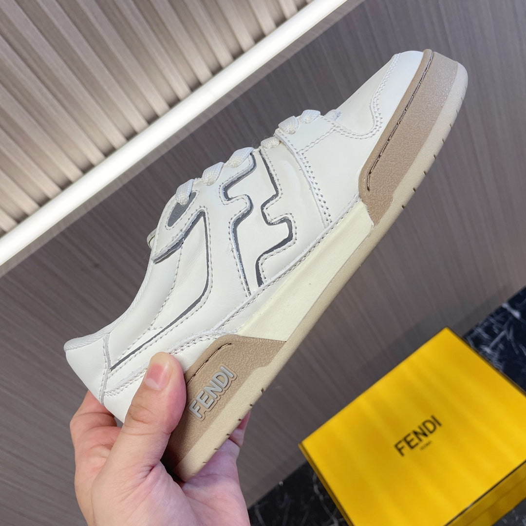 White low-top sneakers with side logo detailing and beige rubber sole, Fendi