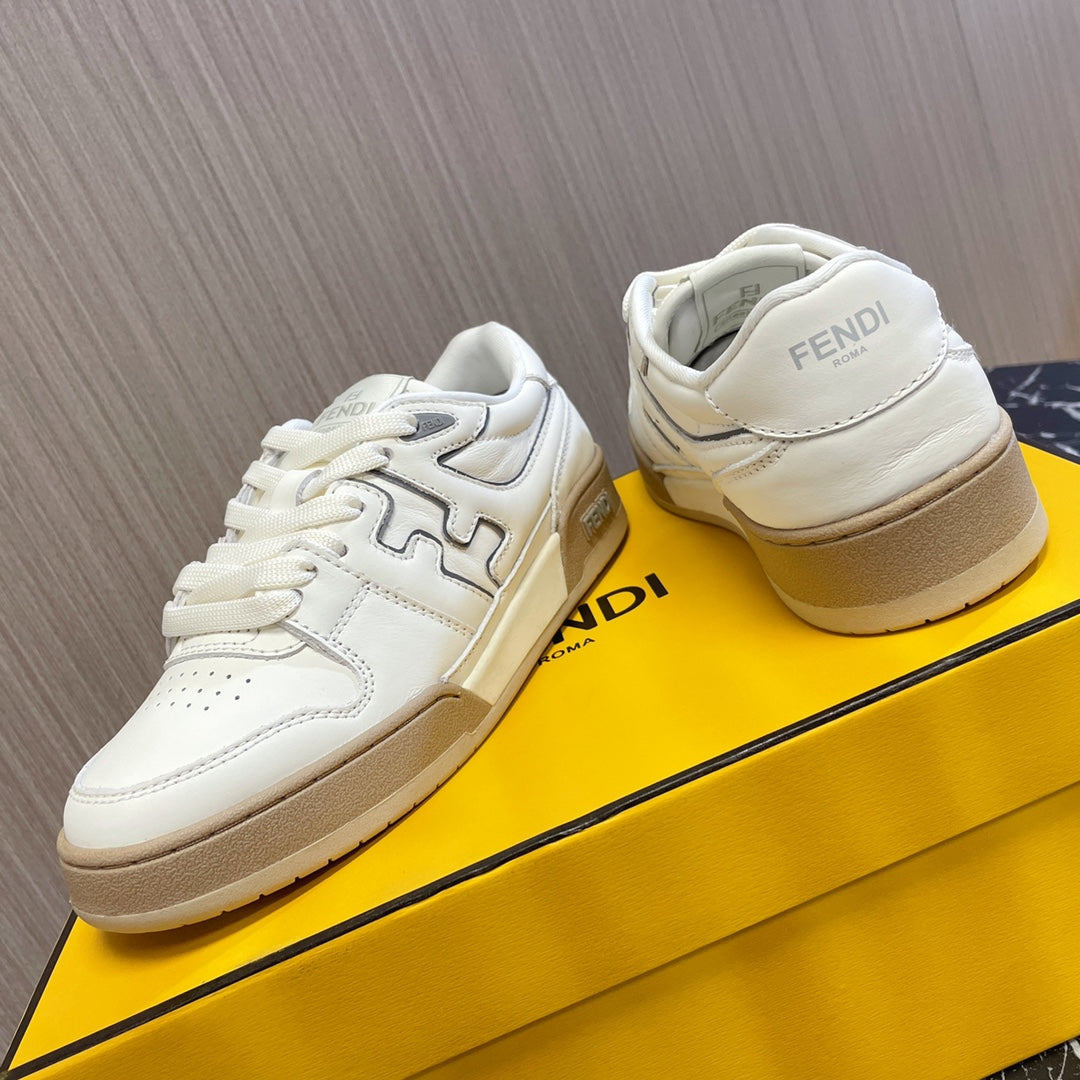 White leather lace-up sneakers with Fendi heel branding and beige sole