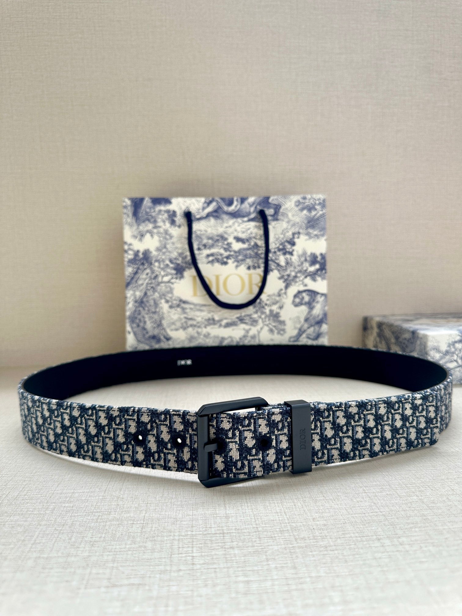 Louis Vuitton belt with blue monogram strap and black square buckle