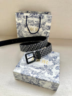 Louis Vuitton belt with blue monogram strap and black metal buckle