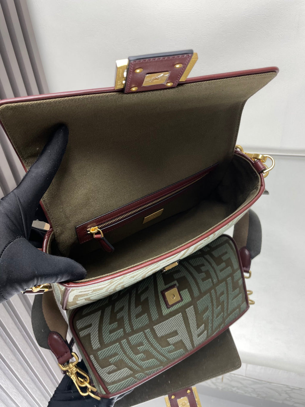 Fendi baguette bag open top, green FF exterior with burgundy interior and gold hardware