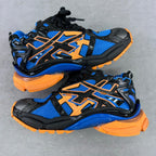 Balenciaga unisex chunky sneakers, blue mesh and orange accents, black laces, layered sole