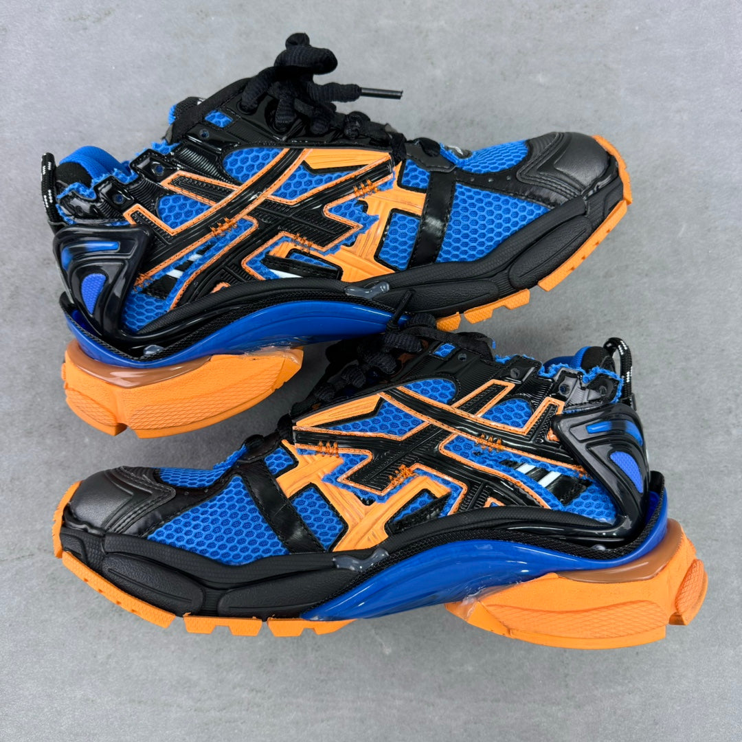 Balenciaga unisex chunky sneakers, blue mesh and orange accents, black laces, layered sole