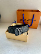 Louis Vuitton logo-buckle belt on folding display with patterned strap