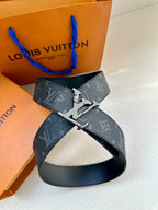 Dark monogram leather belt with silver-tone buckle and belt loop detail