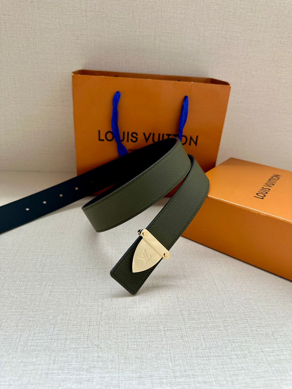 Louis Vuitton leather belt dark green with silver buckle and small attached pouch