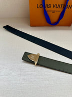 Louis Vuitton leather belt laid flat in dark green with silver-tone logo buckle