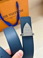 Blue leather belt strap with silver LV buckle, textured leather close-up
