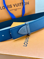 Louis Vuitton blue leather belt with silver-tone buckle across the strap