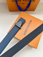 Louis Vuitton blue textured belt with silver-tone buckle and stud holes