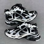 Balenciaga unisex sneaker in white and black with black laces and chunky sole