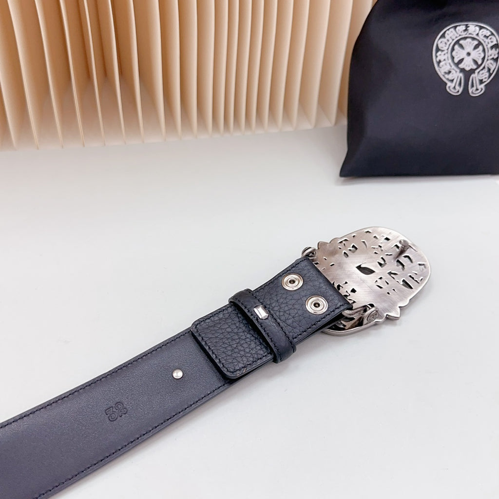 Leather belt with dark blue strap and silver buckle plate with multiple holes