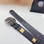 Leather belt with dark blue strap, gold studs, and ornate silver buckle