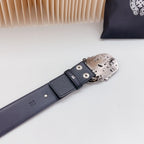 Navy leather belt with metal keeper and perforated silver buckle edge