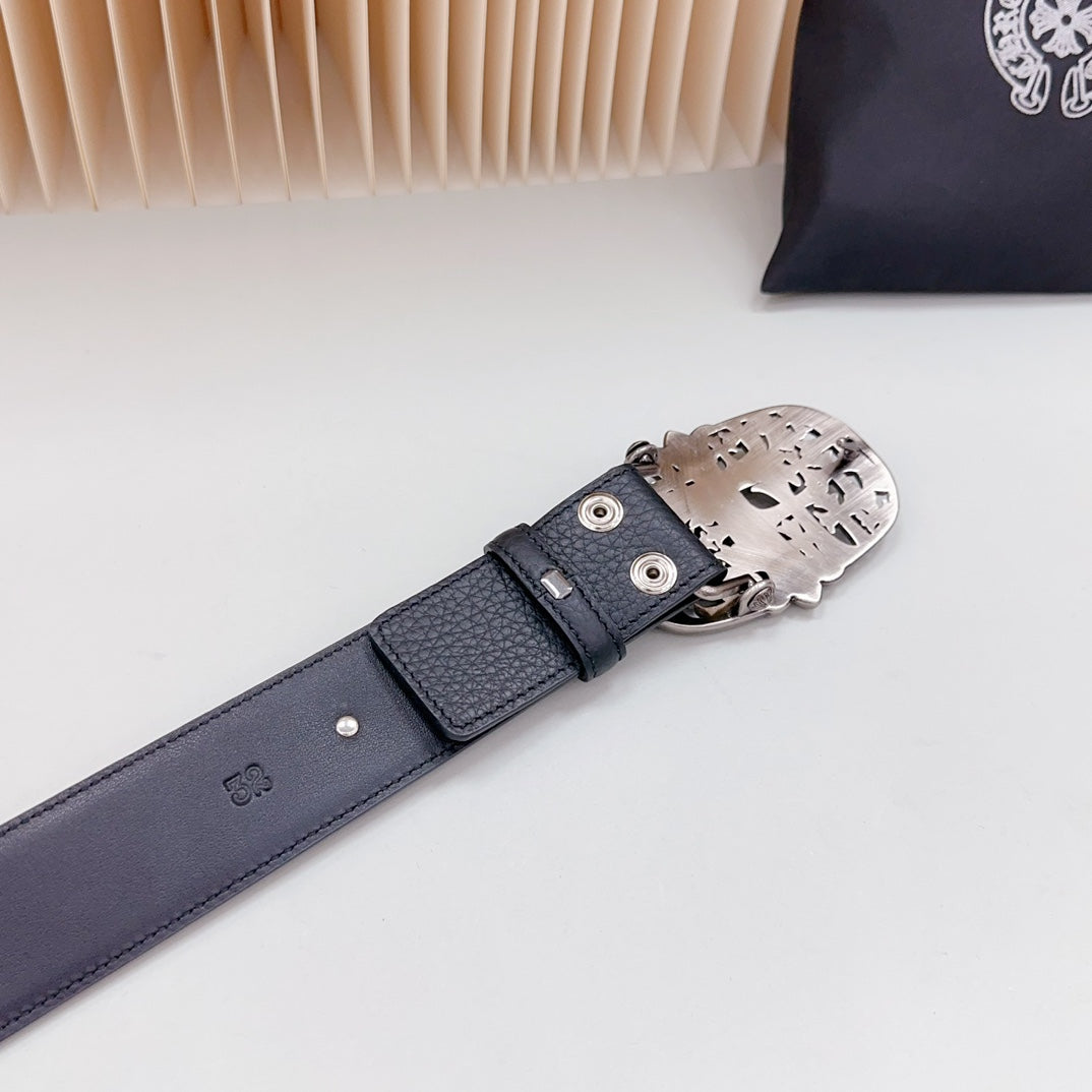 Navy leather belt with metal keeper and perforated silver buckle edge