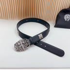 Navy leather belt with large ornate silver buckle and cross plates