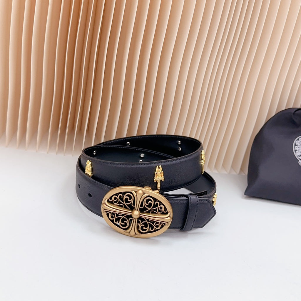 Dark leather belt with ornate gold buckle and adjustable keeper strap