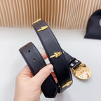 Dark leather belt strap with gold bar hardware and adjustment holes