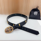 Dark leather belt with gold filigree buckle, keeper strap, and side studs