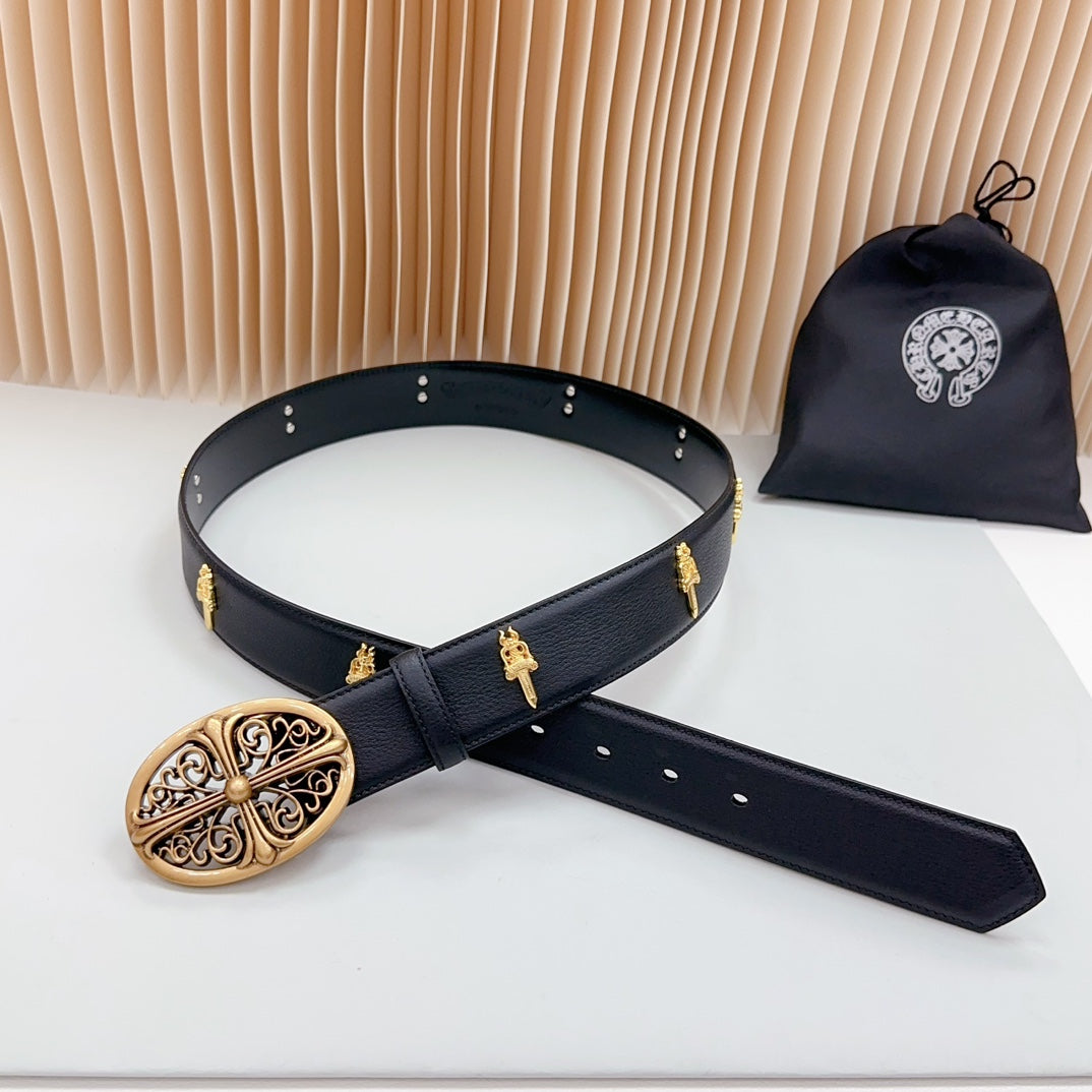 Dark leather belt with gold filigree buckle, keeper strap, and side studs