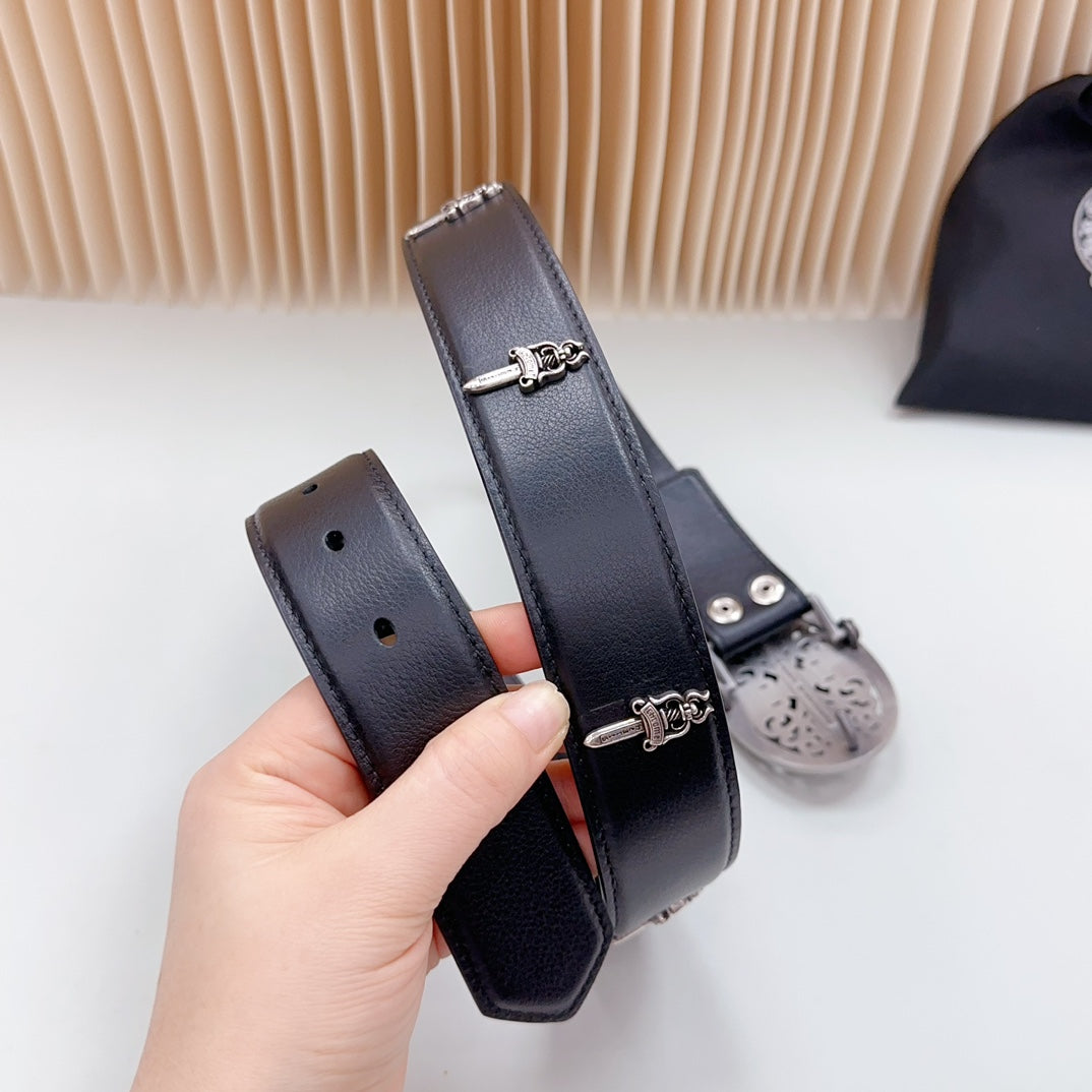 Dark leather belt strap close-up with adjustment bar and silver-tone buckle