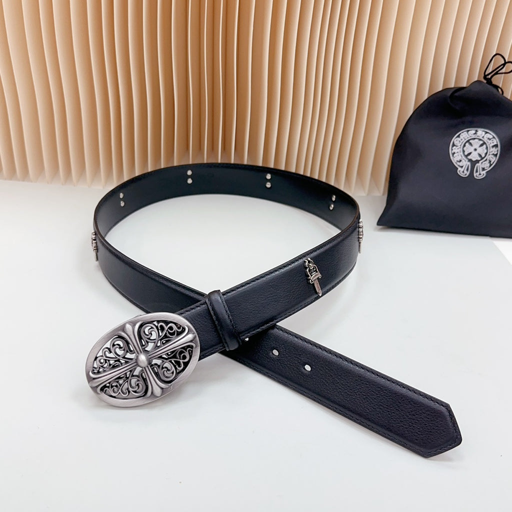 Dark leather belt with ornate oval silver buckle and long extended strap