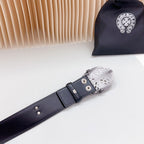 Dark leather belt end with adjustable holes and silver-tone clasp hardware